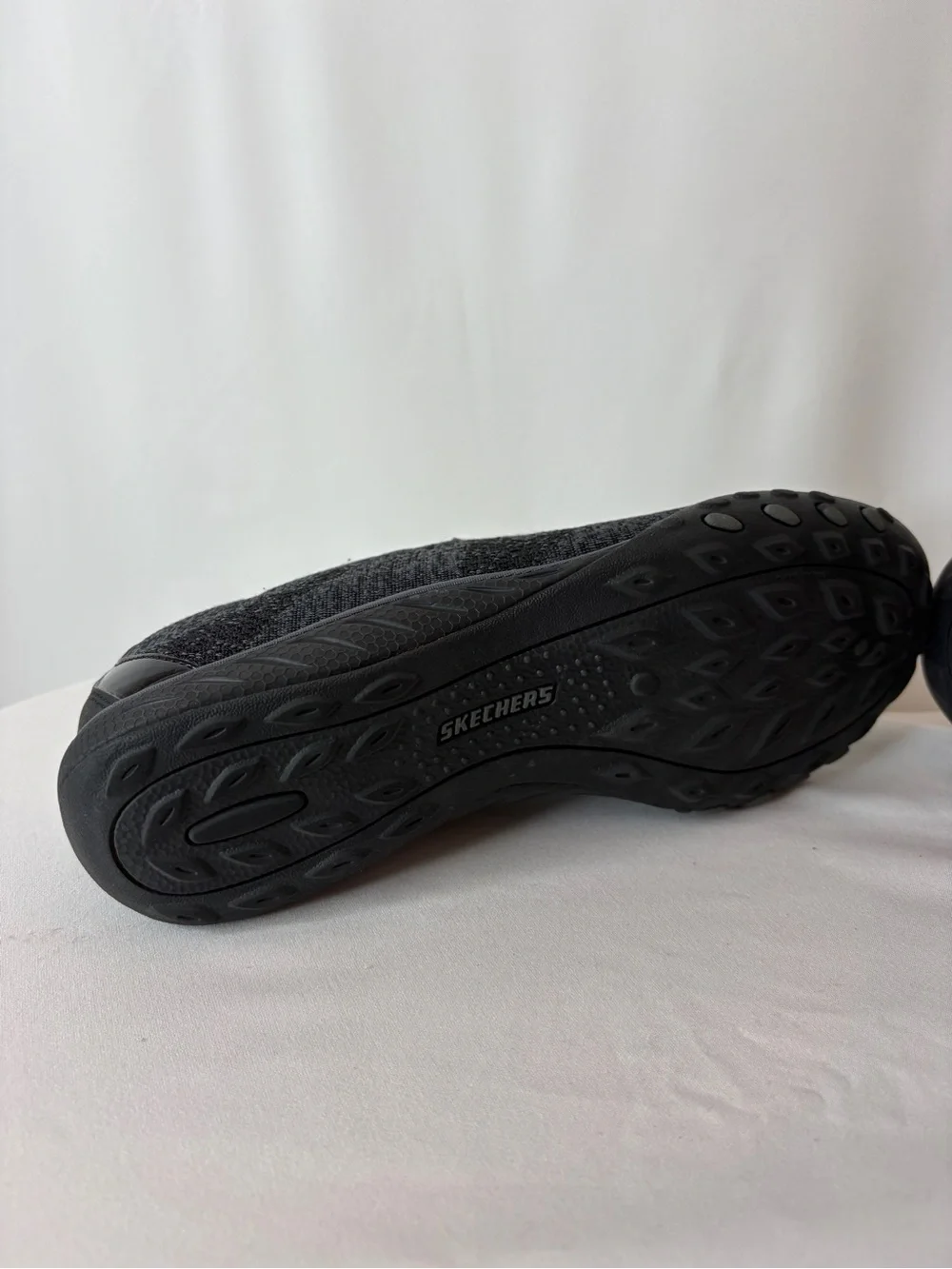 Skechers Women's Black Knit Slip-On Sneakers